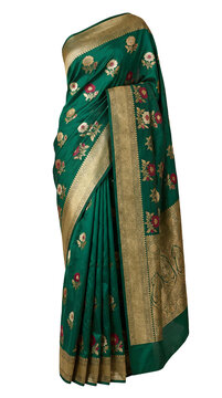 Emerald green silk saree with gold floral motifs on mannequin. Classic royal festivity and vibrant cultural fashion concept.