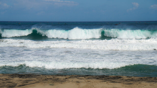 Powerful Ocean Waves Crashing on Sandy Beach