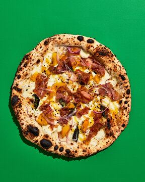 Wood-Fired Prosciutto Pizza with Roasted Squash and Fresh Herbs