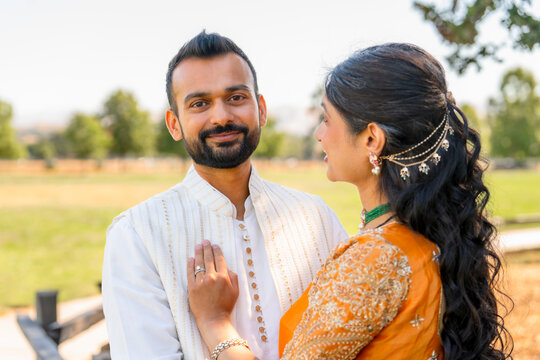Portrait of formal indian couple outside