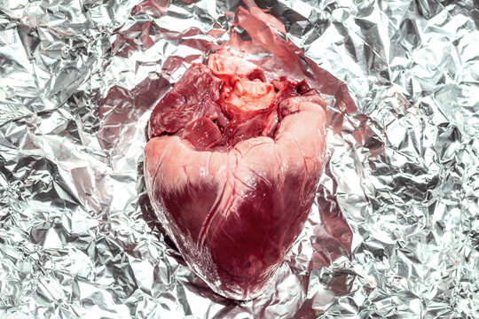 Heart on Silver Foil Surface During Daylight