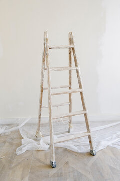 Ladder in bright apartment during home renovation project
