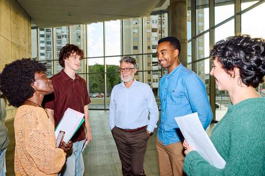 Students talk to their professor at the universtiy
