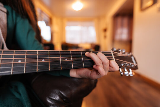 Fingers On Guitar Fretboard