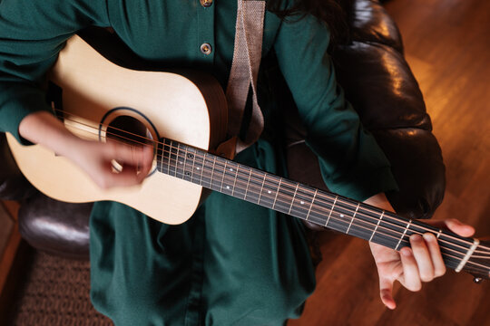 Playing Acoustic Guitar Close Up