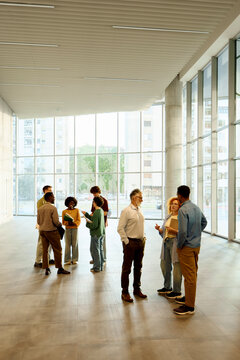 Students share their experiences in the lobby
