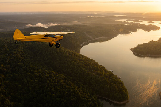 A small plane flies in the sky