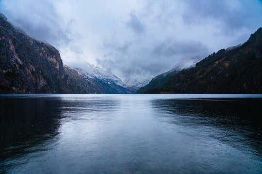 Misty Lake Between Mountains