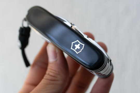 ZAPOPAN, MEXICO - SEPTEMBER 10, 2026: Hand holding closed black Victorinox Spartan PS pocket knife.