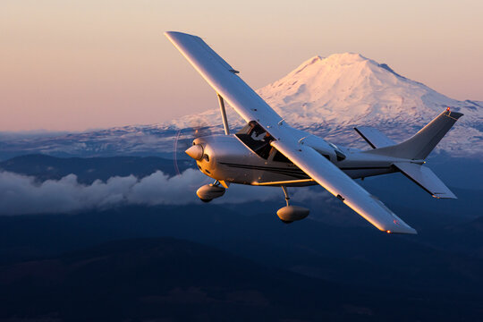 A small plane flies in the sky