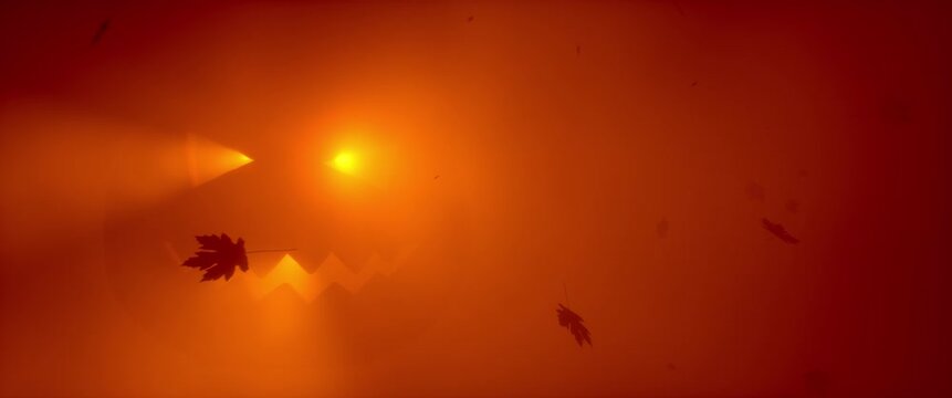 Glowing Halloween jack-o-lantern face in orange red fog with falling autumn leaves silhouettes. Spooky pumpkin glow atmospheric horror holiday background. Seamless loop 3d rendering animation.