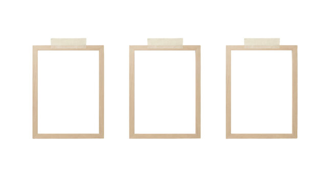 Minimalist wooden photo frames, set of three blank rectangular picture borders attached with adhesive strips, empty wooden art displays for wall decor isolated on transparent background