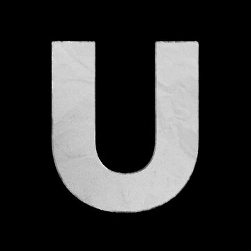 Capital letter U cut from textured white paper isolated on a solid black background