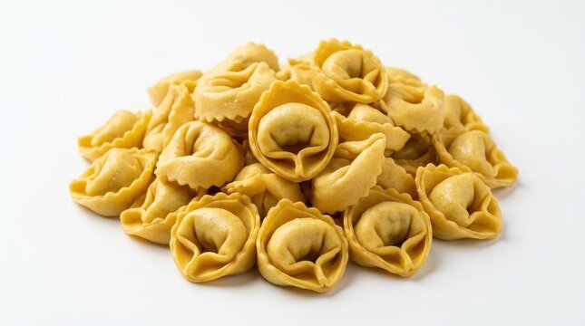 Fresh Uncooked Tortellini Pasta Pile Isolated on White Background - Traditional Italian Egg Pasta
