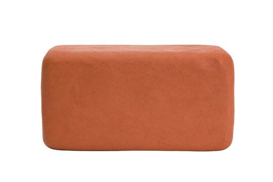 Solid rectangular block of orange clay with a smooth texture and rounded edges, isolated on a white background