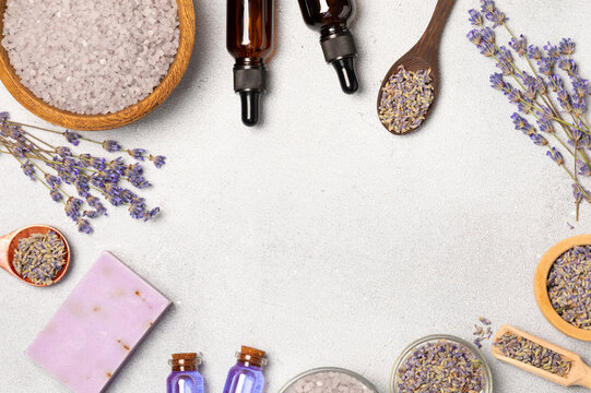 Lavender essential oil in glass and bottles with fresh lavender fowers. Natural aromatherapy. Organic skincare. Herbal cosmetic serum. Spa wellness treatment. Botanical Extract, beauty and self care c