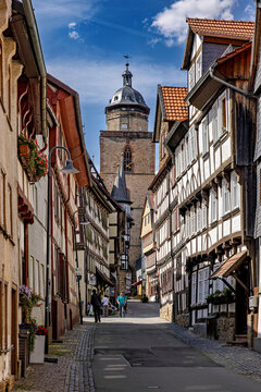 Half-timbered houses line a cobbled street in a picturesque old town: the old town of Alsfeld
