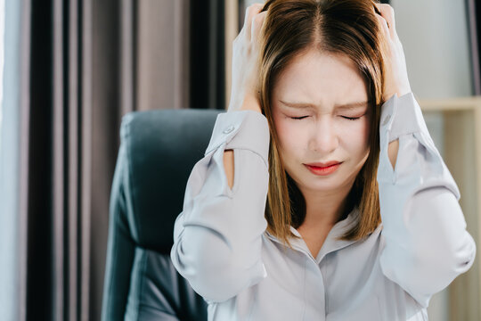 Stressed woman dealing with business tax financial management problem feeling upset in office