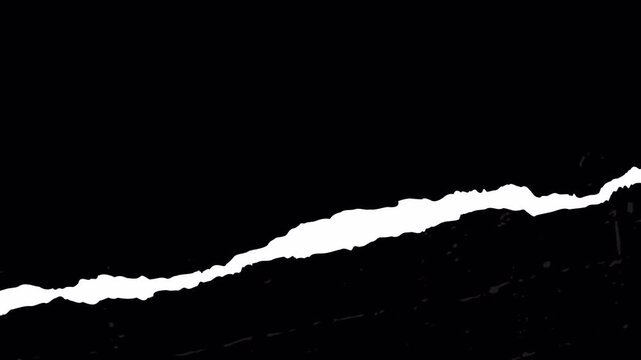 Abstract white paper tear transition effect on black background.
