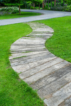 Garden landscape design with pathway in garden and footpath in picturesque summer park and staircase in backyard,Paving stones on floor in park,space for text.