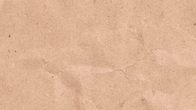 Close up view of light brown textured paper surface.