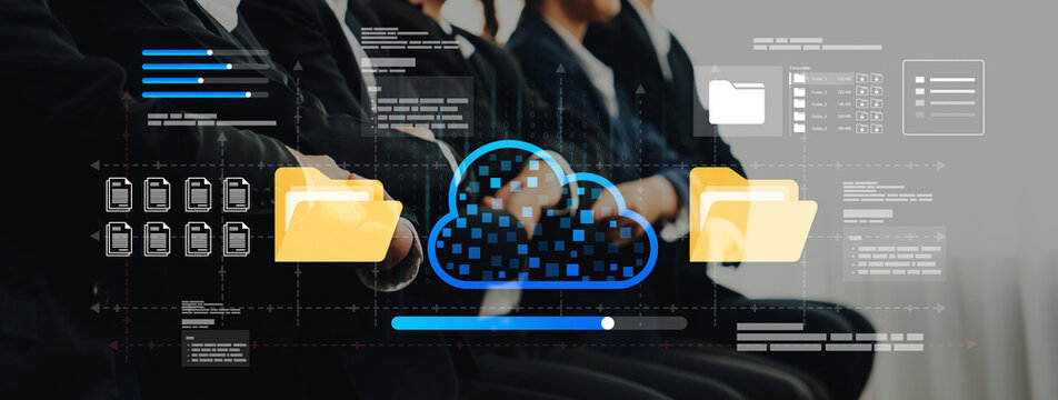 A team of business professionals engages with cloud data concepts in a modern office, showcasing digital graphics that represent technology and efficient data management strategies. Ledger