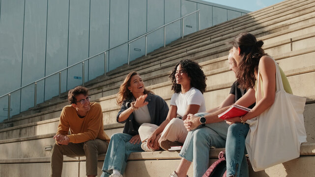 Group of Friends Chatting on Outdoor Steps