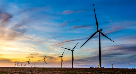 wind turbines at sunset © Robert