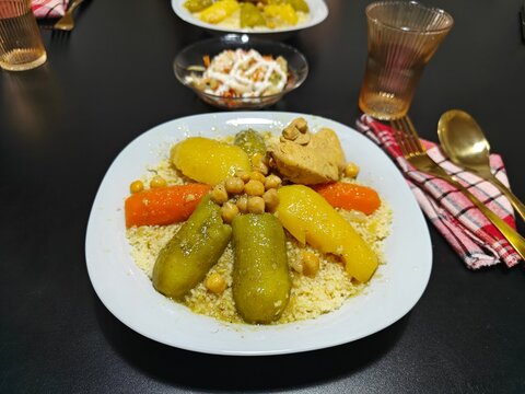 Traditional Algerian Couscous with Chicken and Vegetables