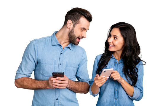 Close up photo wondered she her he him his lady guy telephone smart phone hands arms read reader news look interest eyes wear casual jeans denim shirts outfit clothes isolated light grey background