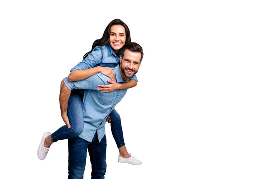 Close up side profile photo funky she her he him his couple lady guy piggyback ride go walk highway adventures soul mood wear casual jeans denim shirts outfit clothes isolated light grey background