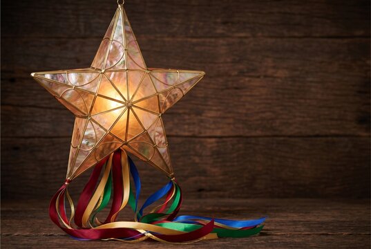 Traditional Filipino Capiz Shell Parol Star Lantern Glowing on Dark Wooden Background with Copy Space