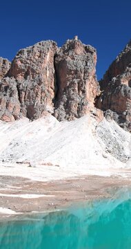 Spectacular Antermoia glacial lake in the Fassa valley