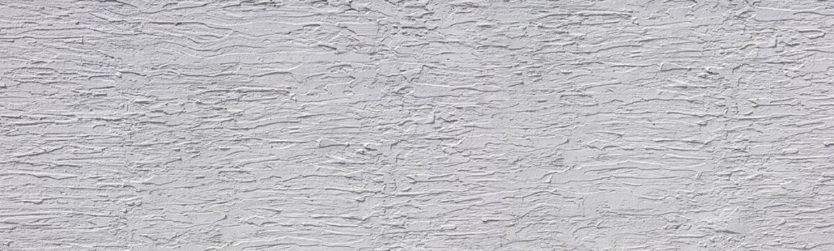 White rough stucco wall texture background pattern