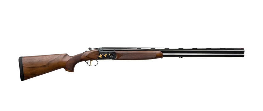 Classic over and under shotgun with engraved wooden stock isolated on white back