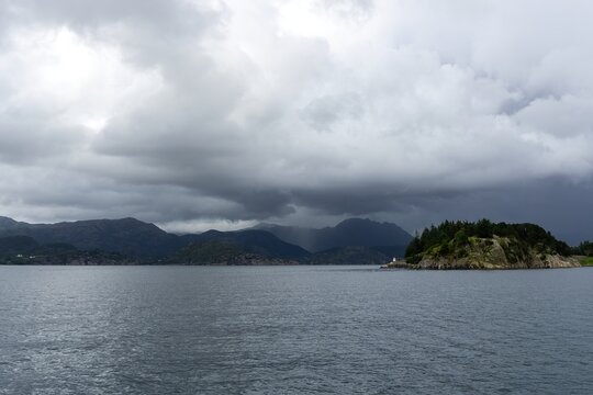H&oslash;gsfjorden fjord landscape under dark stormy clouds