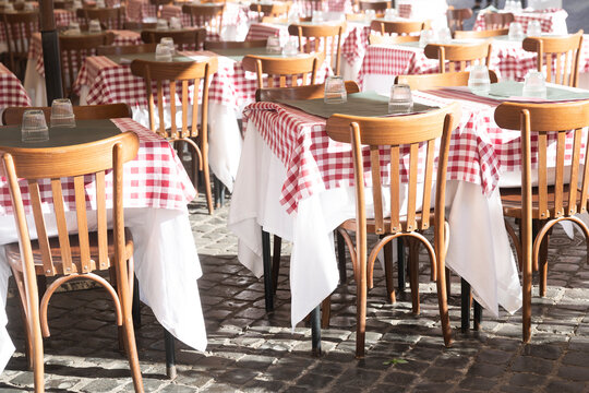 tables and chairs at restaurant in Rome italy