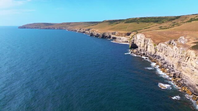 Aerial shot flying along the cliffs of the Jurassic coast in Dorset