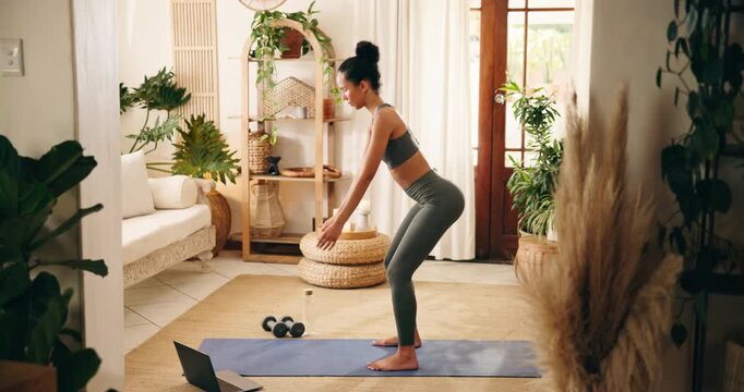 Fitness, squat and woman with laptop in home, virtual workout class and video tutorial for streaming. Legs training, online exercise subscription or person with pc for routine, balance or internet