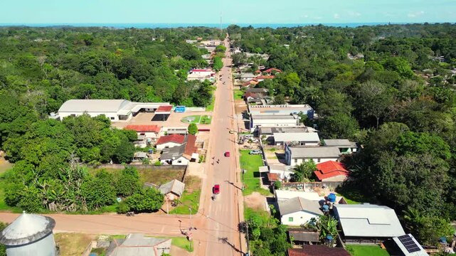 Aerial drone footage over Belterra, Par&aacute;, Brazil, a unique planned town established in the 1930s as part of an international rubber production project in the Amazon. The town preserves its distinctive