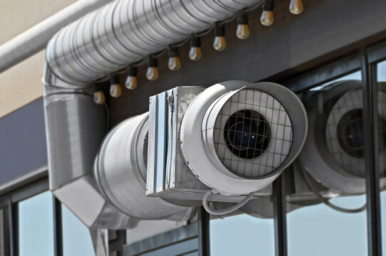 External inline duct fan with grille