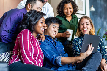 Fototapeta premium Diverse group enjoying digital content.
