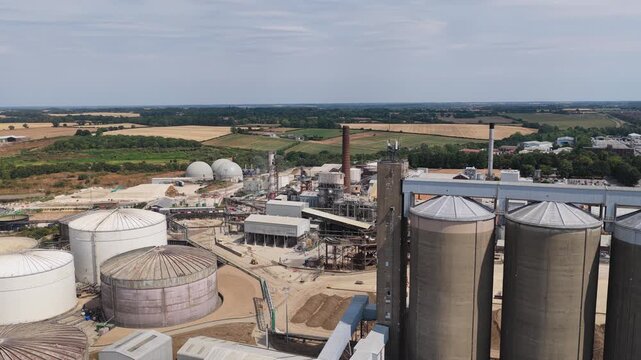 Aerial View of Sugar Refinery and Storage Silos on a Clear Summer Day