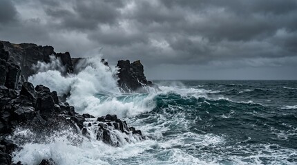 Fototapeta premium Dramatic Dark Stormy Sea Crashing on Black Basalt Rocks