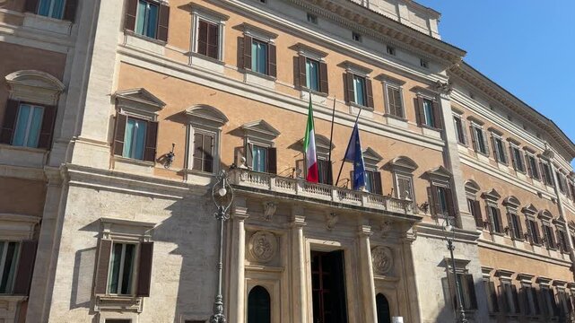 Low angle tilt up shot of Palazzo Montecitorio facade without people Rome