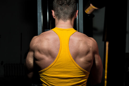 fitness trainer doing exercise for back