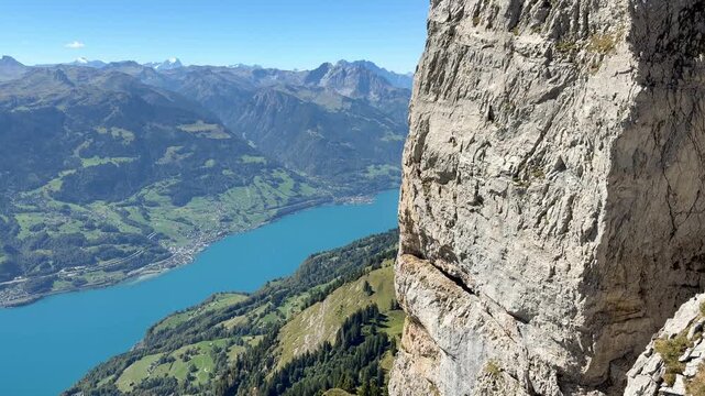 Expansive mountain view over Lake Walen from the Swiss Alps, symbolizing perspective, mental clarity, freedom, reflection and gaining distance from everyday life.