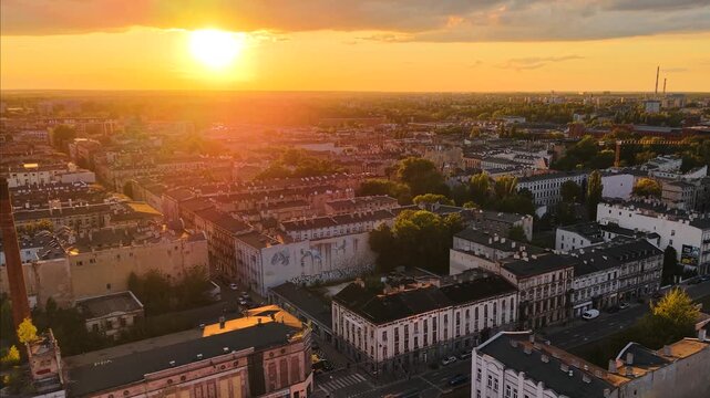 Panoramic sunset drone shot over downtown of Lodz city, Poland