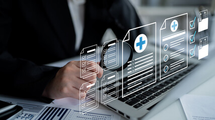 Business professional analyzing health care documents on computer with digital icons and checklists...