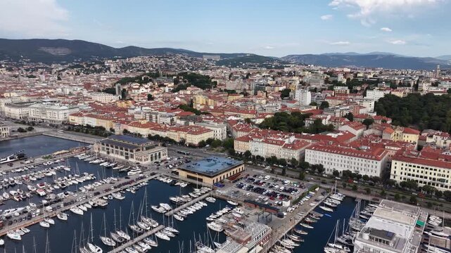 Aerial view of Trieste Marina harbor and coastal skyline, Italy